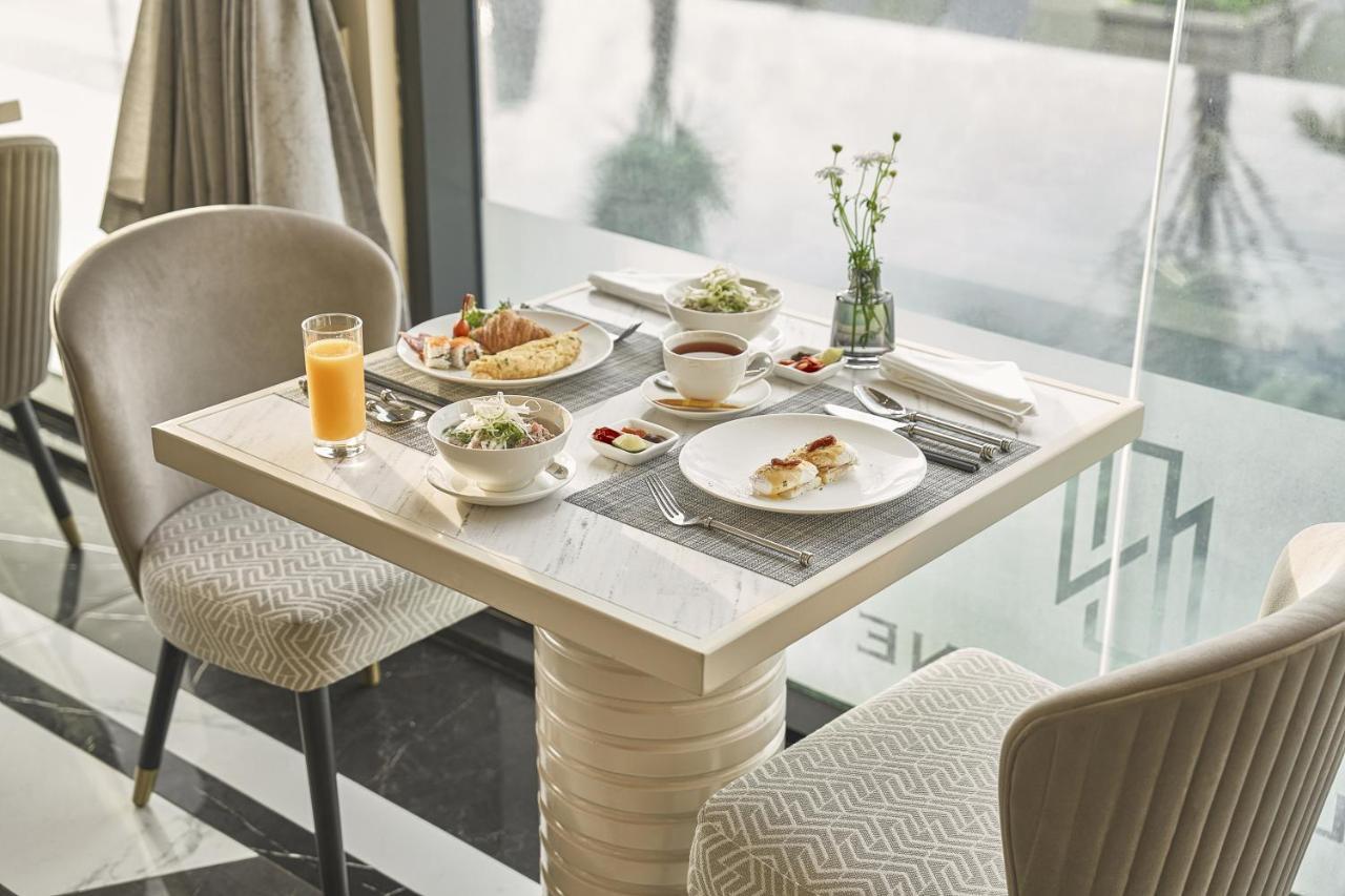 Hotel La Siesta Premium Saigon Ciudad Ho Chi Minh  Exterior foto A table set for breakfast